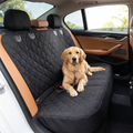 Waterproof dog car seat cover fitted on a car back seat