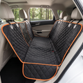Hammock-style waterproof dog car seat cover installed across a back seat
