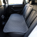Reusable washable dog pee pad on a car seat